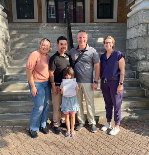Rob Rosa and family with Mayor Robert Cone