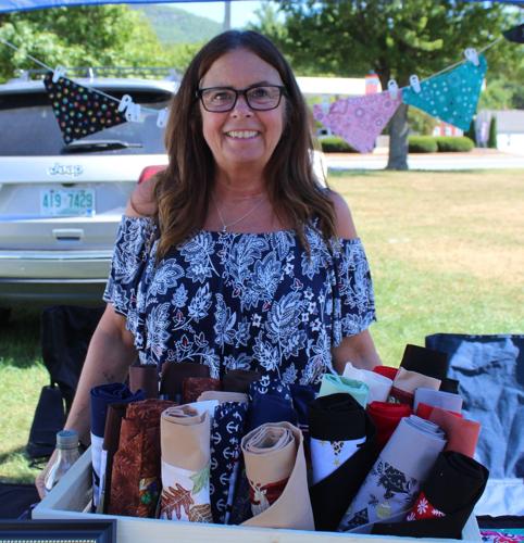 Lisa Lavigne displays the sewing and craft projects she makes for pets, kids