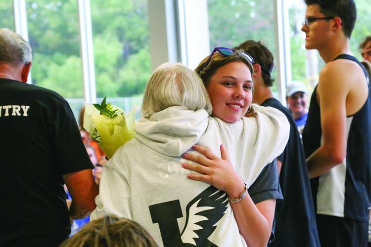 09-26-26 KHS XC seniors hembree hug