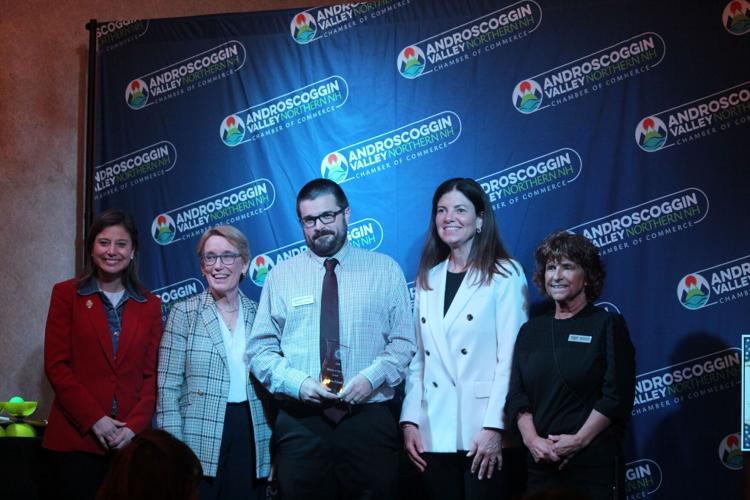 Bronson Frizzell (center) is Androscoggin Valley Chamber of Commerce Director of the Year