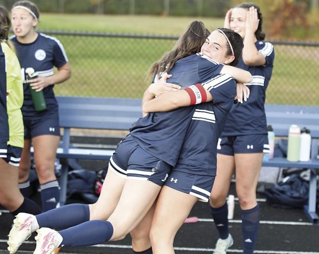 FA Girls Soccer - Juliana Pacini and Carlin Galligan celebrate