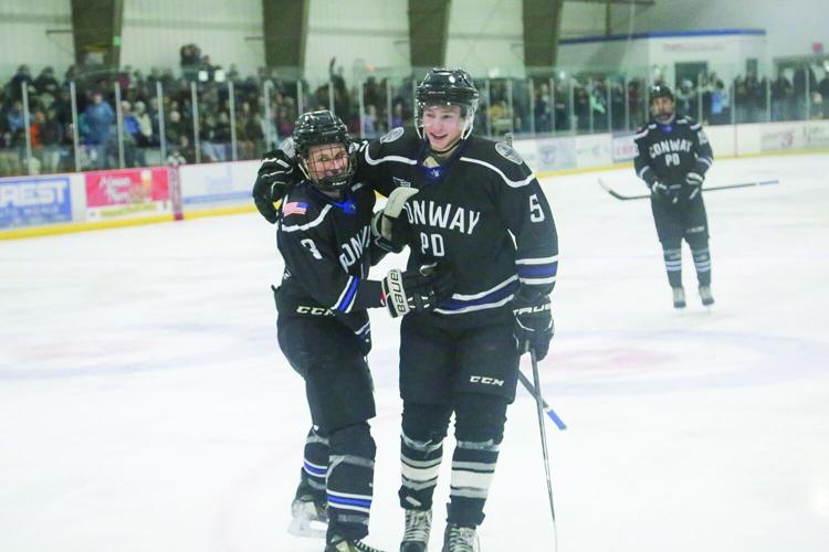 03-23-26 Battle Badges Hockey goal hug