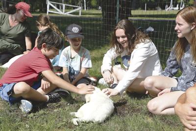 07-05-21 Little Angels and Kids group petting puppy