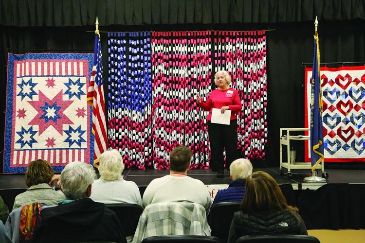 11-09-25 Quilts of Valor quilt leader wide