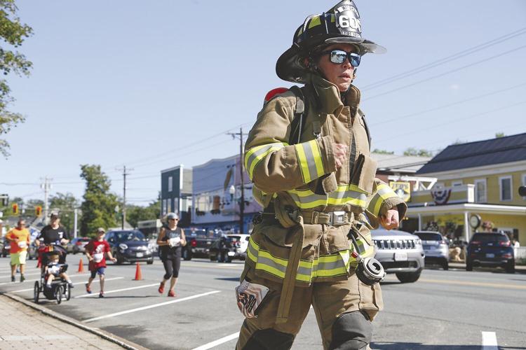 7-10-21 Tunnels to Towers firefighter Kerr on sidewalk tight