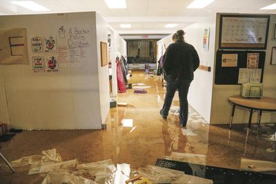 12-19-23 Flood Damage walking through water