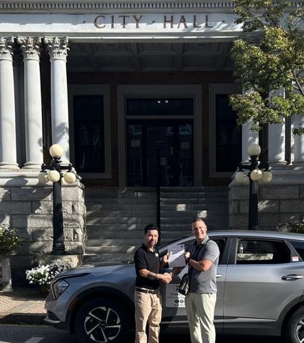 Rob Rosa (left) and Mayor Robert Cone outside of City Hall in Berlin