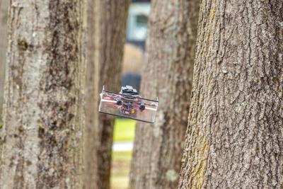 This small drone is using sonar, similar to bats' echolocation, to navigate through a grove of trees. Nitin Sanket