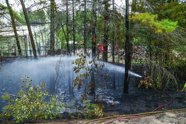 08-13-25 Holiday Inn-Brush Fire hosing behind hotel 2