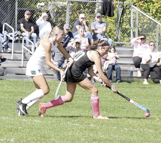 KHS Field Hockey - Macie Marcotte shields the ball
