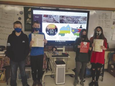 Gorham students 'walk a mile' with refugees