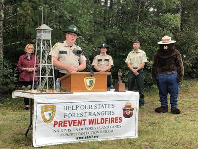 Capt. Doug Miner receives the 2021 Smokey Bear Award