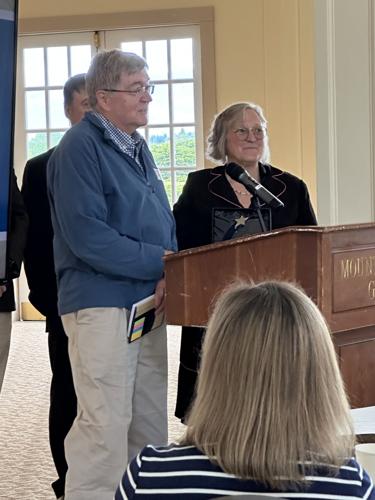 Kirk Stone (left) receives the 2026 Spirit of Community Action Award