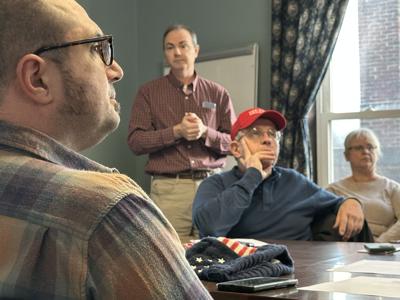 Northern Biogas official Robert McHale (standing)