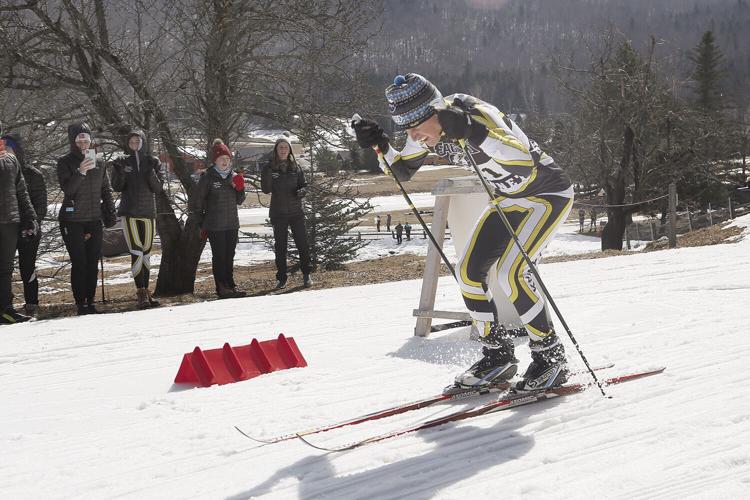 03-10-22 KHS Nordic gabe finish and teammates cheer