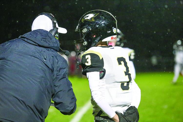 10-24-25 KHS FB brown with coach