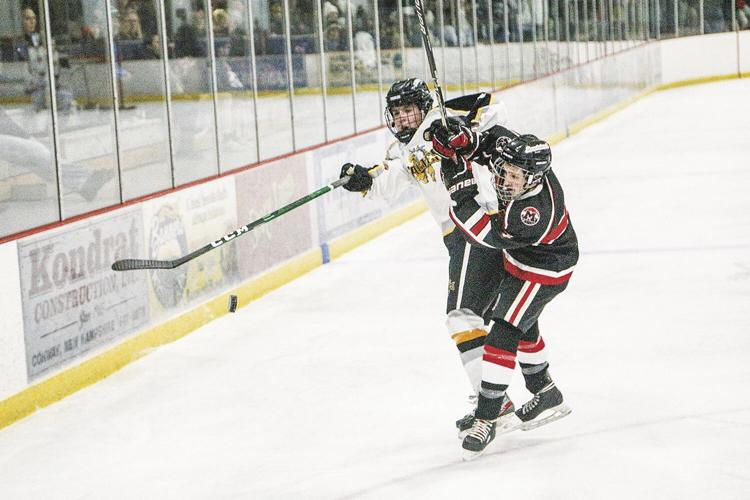 12-14-22 KHS-Berlin Hockey croteau-murphy colliding by puck 2