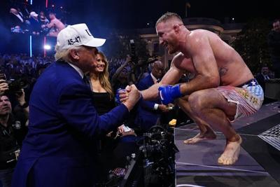 Justin Gaethje shakes hands with President Donald Trump after winning the UFC lightweight title fight at the White House on June 14, 2026.