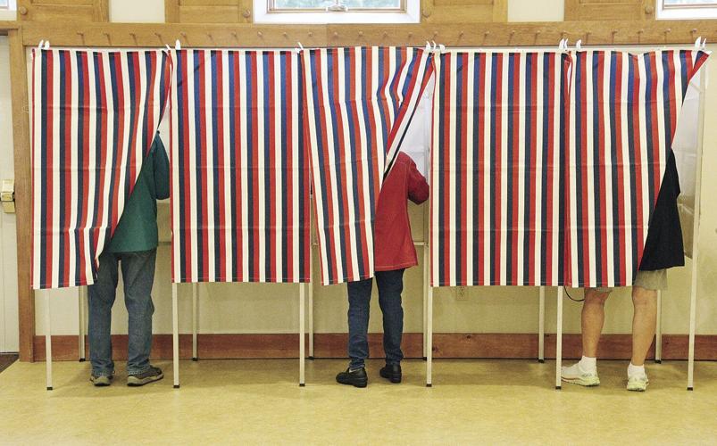 09-13-22 Primary Voting Jackson voters in booths