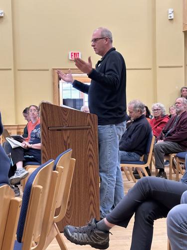A Gorham resident speaks about details of the proposed sidewalk improvement grant