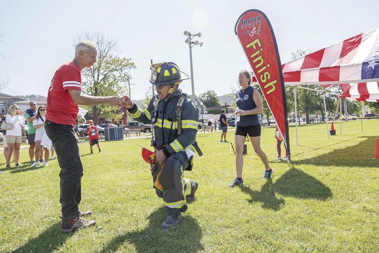 07-09-22 Tunnels to Towers firefighter getting medal