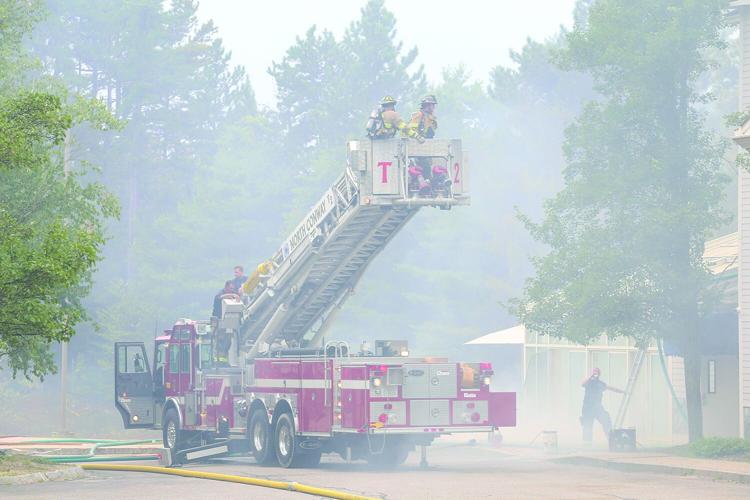 08-13-25 Holiday Inn-Brush Fire ladder truck lifting 2