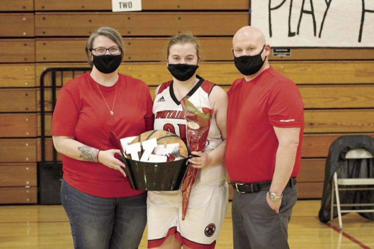 Berlin girls hoop - senior night - Kyra Woodward with her parents