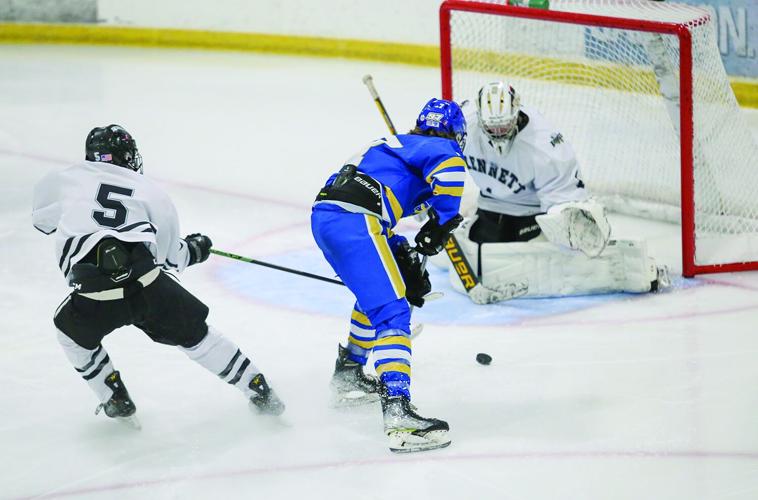 12-27-25 KHS-Maine Hockey truman at net