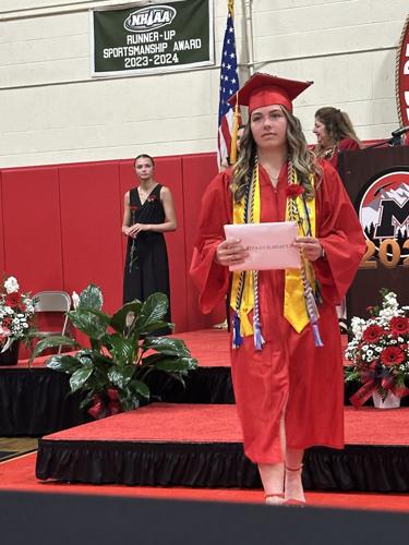 Emma Guilbeault walks from the stage during the June 13 graduation