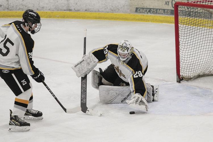 01-21-23 KHS Hockey moore covering