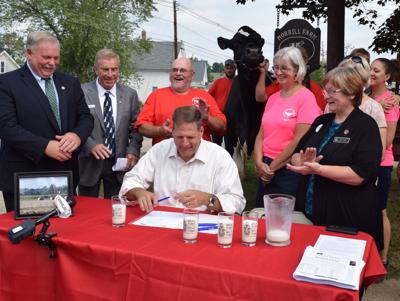 Governor signs N.H. Dairy premium bill