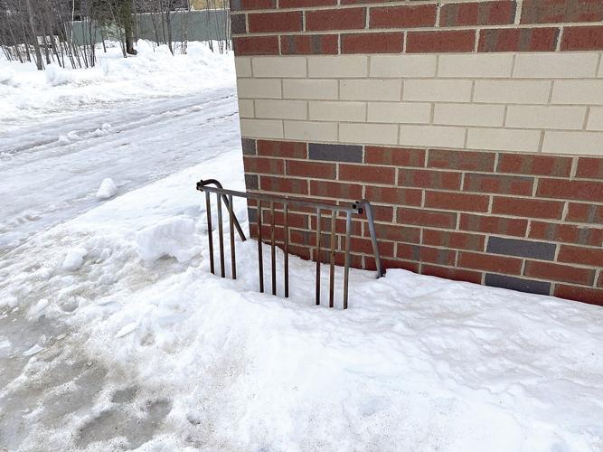 Wheel Family Fun - old rusty bike rack at KHS