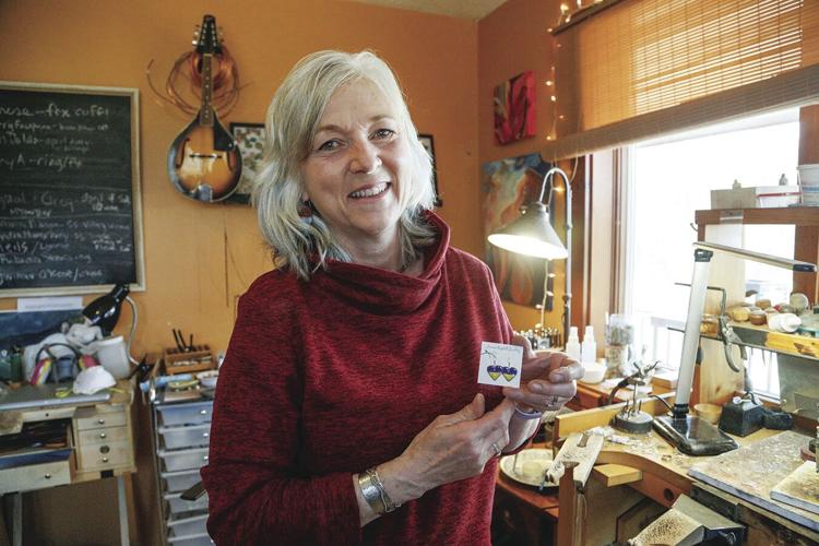 04-06-22 Guptill Earrings holding horizontal