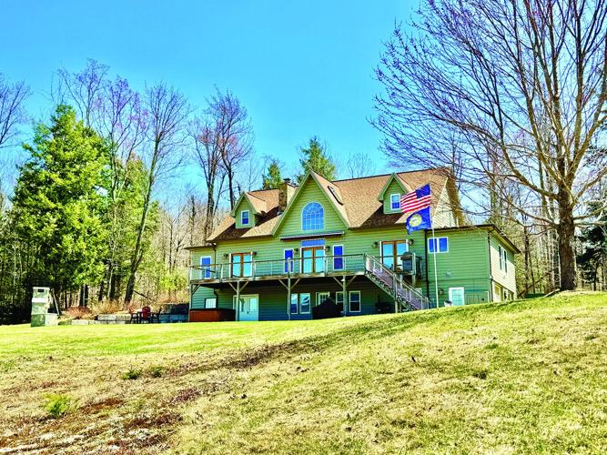 64 Towle Road in Jackson - Exterior spring.jpg