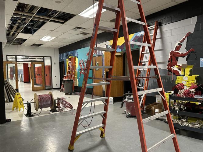 Electrical repairs inside BMHS corridor