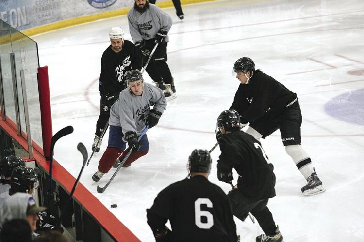 11-26-22 KHS Hockey Alum luchetti along boards