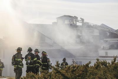 04-30-22 Red Jacket Fire firefighters grouped hazy