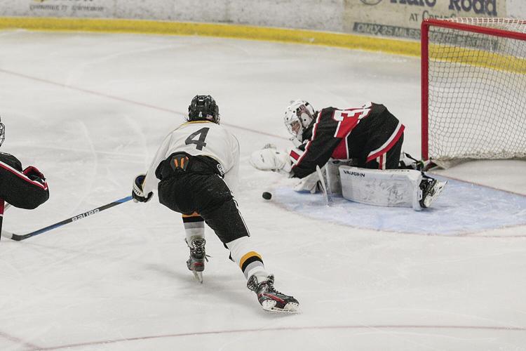 12-14-22 KHS-Berlin Hockey seavey by goalie