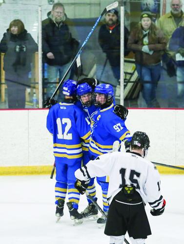 12-27-25 KHS-Maine Hockey ice cats goal hug