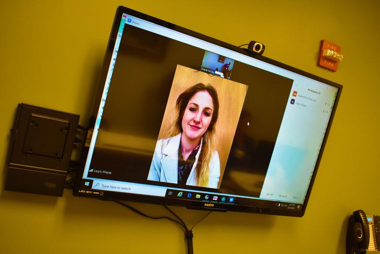 Practice Manager, Lucy Williams, tests the telehealth technology.jpg