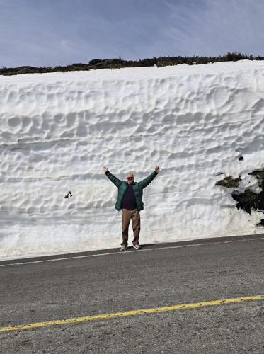 spring tour guest by snow wall