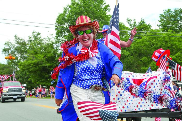 07-04-26 Fourth Parade Bartlett big smile march