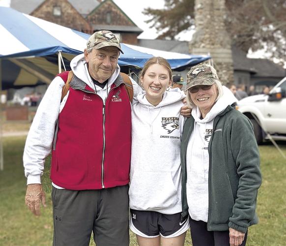 Molly DellaValla with coaches