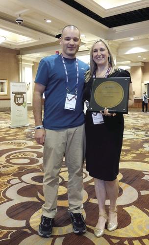 Holly Fougere gets national education award with husband