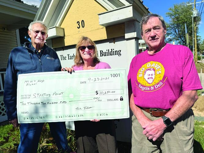 Valley Voice - WV Hogs Alumni present check