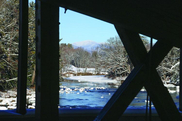 12-03-25 Snow view through bridge