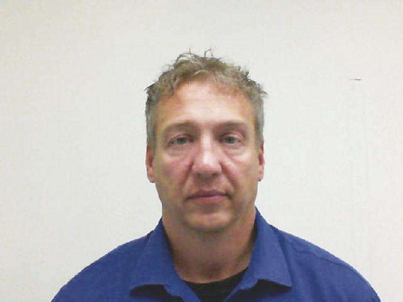 Mass. man charged with touching kids