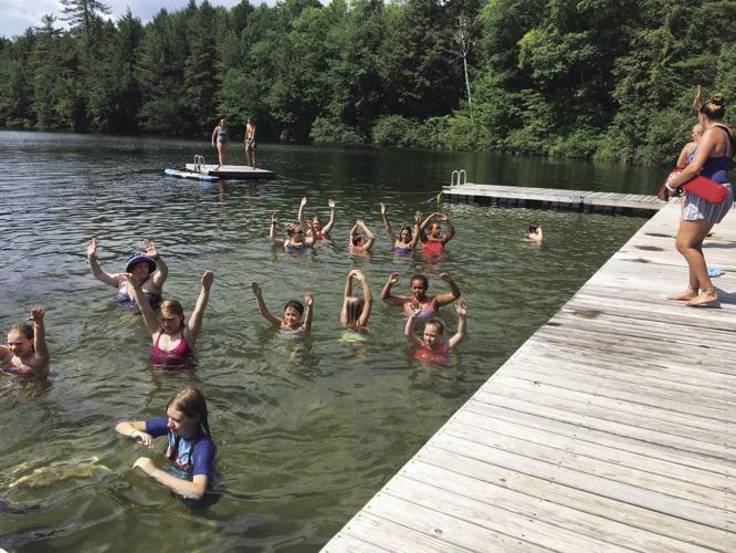 Campers enjoy a water aerobics class.jpg
