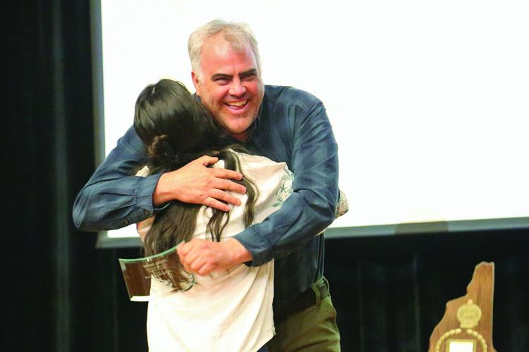 03-18-26 KHS Winter Sports Awards ski jump hug