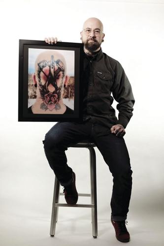 greg mossman with photo of tattoos